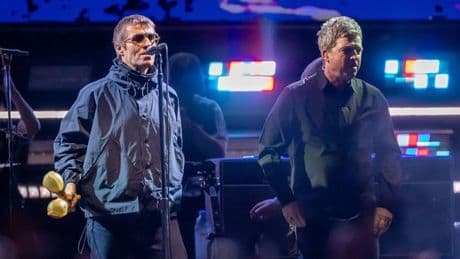 Legendary songwriter spotted at Oasis gig and fans go wild for unexpected reason