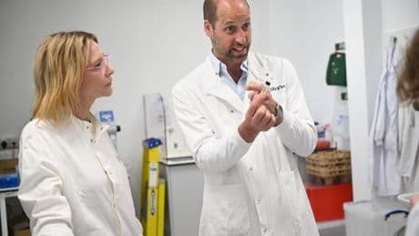 Prince of Wales and Cate Blanchett don lab coats to see eco brand at work