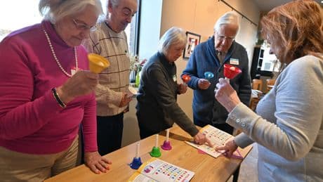 Memory cafes offer camaraderie and fun for people with dementia — and their caregivers
