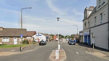 Toddler bitten by bull-type dog outside shop as police probe attack