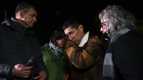 Rescue crews searching for five trapped Chilean miners find body