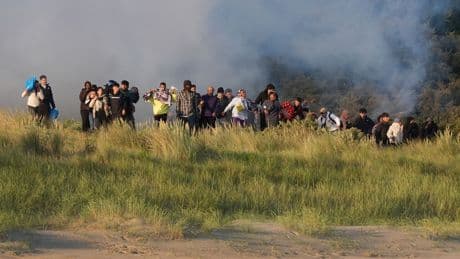 French police fire tear gas at migrants &#8211; as No 10 admits Channel crisis 'deteriorating'