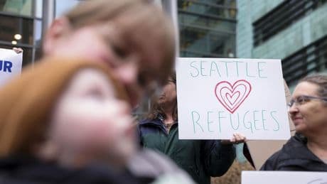 Judge orders Trump to admit roughly 12,000 refugees