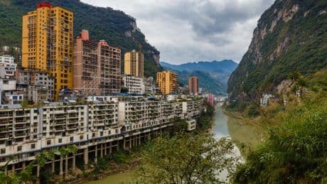 Inside world’s narrowest city home to 450,000 people who can shake hands across street – but ‘sit on edge of disaster’