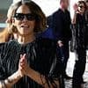 Halle Berry covers up in a dramatic sequinned tunic as she arrives for the Cannes Film Festival after organisers sensationally banned racy gowns from the ceremony