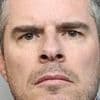 French teacher, 46, who posed as boy online to entice teen girls to send sexual images is jailed for eight years