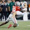 Sayin passes for 3 touchdowns, top-ranked Ohio State pulls away in second half to defeat Ohio 37-9