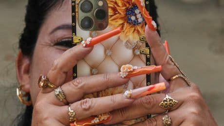 Photos of Cuban women embracing nail art as escape from economic crisis