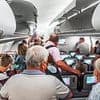 Plane passengers who unbuckle seat belts and stand up before it is time to disembark face £50 fines