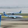 Japan flight made emergency landing after man tried opening door