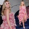 Heidi Klum puts on a leggy display in a pink floral floor-length gown as she poses at luxury five-star hotel ahead of Cannes Film Festival opening