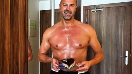Paddy McGuinness shows off his chiselled as he holidays with ex Christine