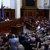 Moment MPs brawl in Ukrainian parliament during vote on Zelensky's new anti-corruption bill after his reform plans sparked mass protests