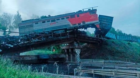 Explosions caused 2 bridges in western Russia to collapse, officials say. Seven people were killed