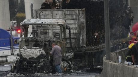 Gas tanker explosion in Mexico City leaves flames billowing and dozens injured with serious burns