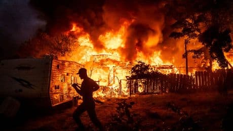 Homes destroyed as quick-moving wildfire burns through historic California Gold Rush town