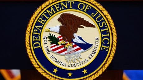 U.S. government employee charged with trying to give classified information to a foreign government