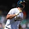 Kurtz, Butler power A's past Red Sox 5-4, end Chapman's hitless streak of 50 batters, 17 appearances