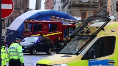Liverpool parade disaster: Emergency crews lift car to free child and three others
