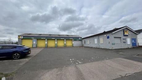 Former tyre and exhaust garage in Craigneuk put up for sale