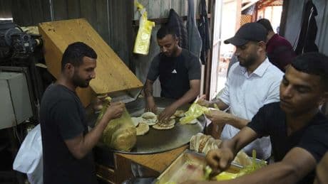 Israel may change tack to allow aid groups in Gaza to stay in charge of non-food aid