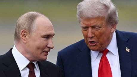 Donald Trump channels inner Meghan Markle with subtle 'power pat' at Putin talks