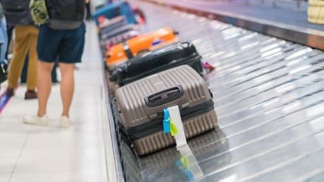 Child, 2, slips behind JetBlue ticket counter to go for joyride on conveyor