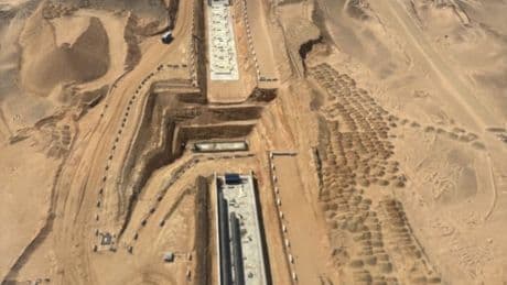 Aerial pics show world’s biggest building site for 105mile sideways skyscraper ‘The Line’… but project faces big blow