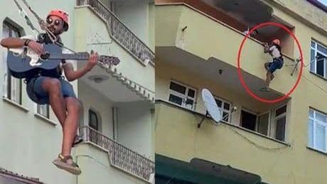 Öğrenci evine şarkıyla veda etti! Eşyaların taşındığı halatın üzerinde gitar şov yaptı
