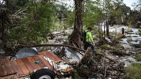 Texas floods miracle as two missing girls 'found alive clinging to 30ft tree'