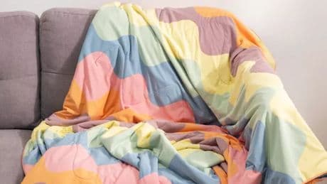 'I tried a cooling blanket from Oodie to see if it would help me sleep in a heatwave'