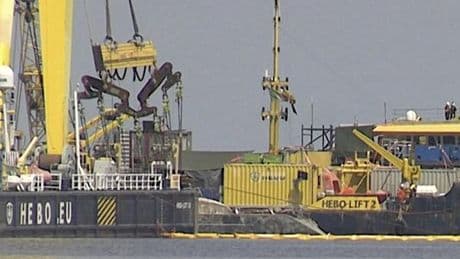 Superyacht raised from seabed 10 months after sinking off Sicily with loss of 7 lives