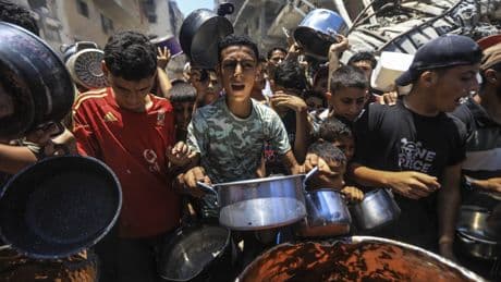 Israel shifts focus to Iran, while killings of Palestinians at aid sites continue