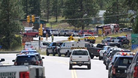 Authorities say student who had been radicalized fired revolver at Colorado school, wounding 2