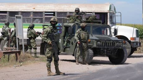 Bodies hang from bridge as Cartel violence leaves 20 dead in Mexico