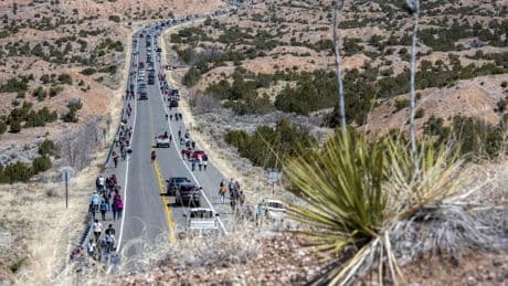 Thousands of pilgrims trek through New Mexico desert to historic adobe church for Good Friday