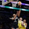 Angel Reese tops 15 rebounds for record 4th straight game as Sky beat Sparks 92-85