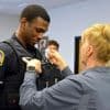 Employers have used E-Verify for years. ICE's arrest of a Maine police officer raises new questions