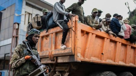 Red Cross escorts over 1,000 disarmed Congolese soldiers from rebel-controlled city to capital