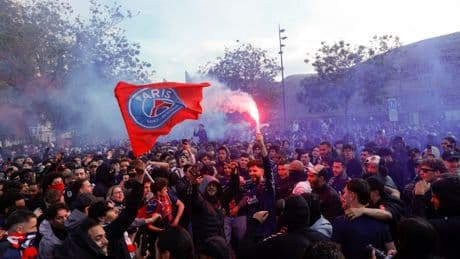 French riot police ‘tear gas entire streets’ as fans ‘throw fireworks’ in chaotic scenes before PSG vs Arsenal