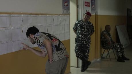 Battered by war and economic crisis, Lebanon holds first local elections in almost 10 years