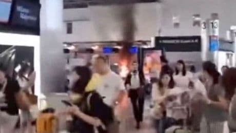 Milan Malpensa Airport passenger 'ran for her life' as rampaging man starts fire