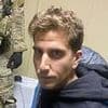 The moment he knew he'd been caught: Bryan Kohberger's stone-faced glare at arresting officer at his parents home