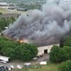 Firefighters and member of public die in blaze at business park