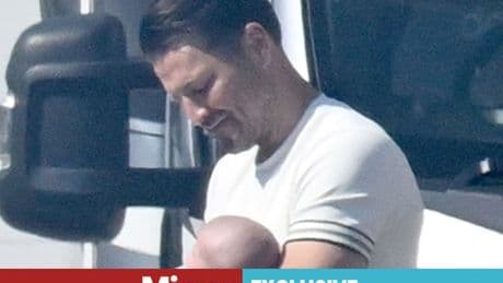 'Besotted' dad Mark Wright cradles baby Palma as he supports Michelle Keegan's return to filming