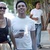 Iris Law sparks romance rumours as she strolls through Notting Hill with DJ Tommy Gould as the pair go flower shopping at Portobello Road Market