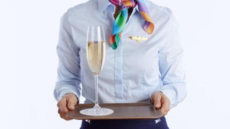 Major airline apologises after serving WINE on a flight to boy, 3, in business class