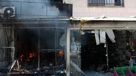 Smell of Death Lingers in Syrian City After Spasm of Violence