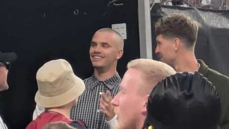 Romeo Beckham spotted at Oasis gig with footballer as he risks telling off from dad