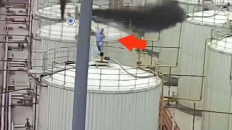 Watch moment worker runs for his life & dodges death by just inches as chemical tanks explode around him killing five